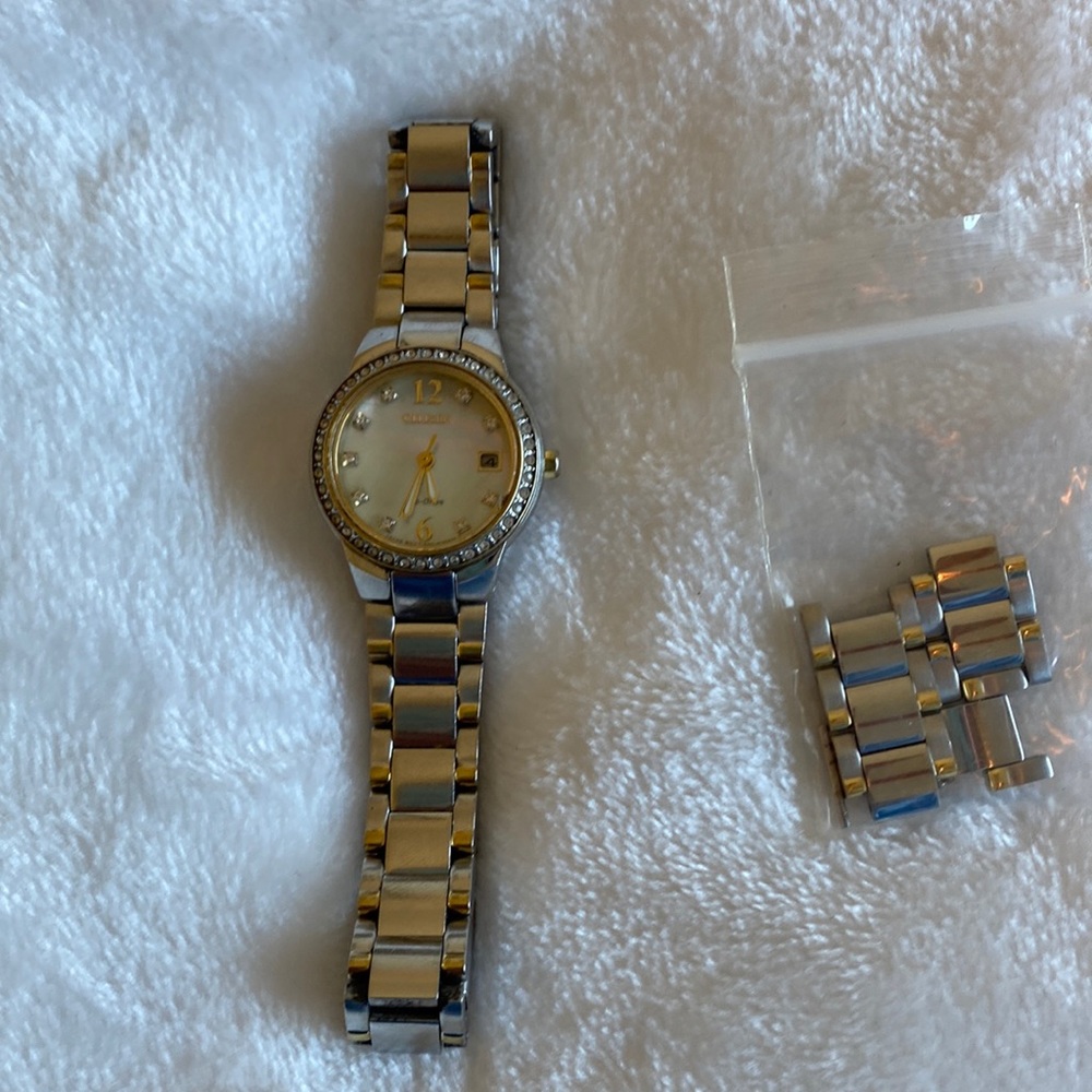 Citizen watch with diamonds and mother of pearl face
